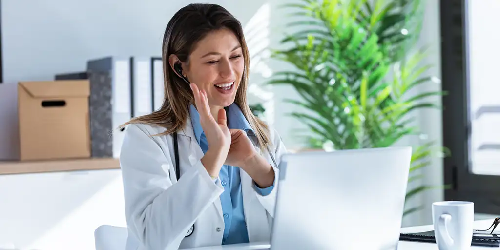 A provider connecting with a patient through a video appointment